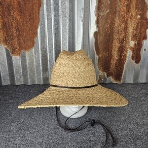 Sun's out, hat on! Ready for some beach time with this classic raffia Straw Hat